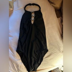 Gottex one piece with rhinestones size 12 from Saks Fifth Avenue.